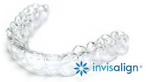Invisalign logo over clear orthodontics